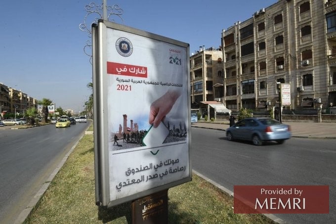 Pancarta electoral en Siria: "Su voto en las urnas es una bala dirigida al pecho del atacante" (Fuente: twitter.com/aabnour, 5 de mayo, 2021)