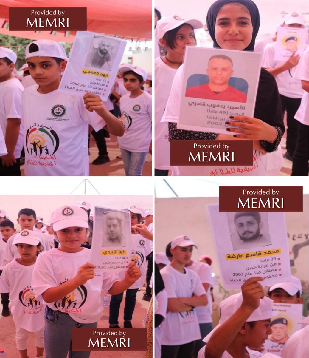Campistas en Belén sostienen pancartas con fotografías de los prisioneros y detalles sobre estos: su edad, de dónde provienen y el año en que fueron encarcelados (Facebook.com/hcyspalestine, 18 de julio, 2022)
