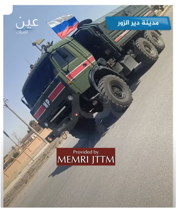 A military truck on a roadDescription automatically generated with low confidence