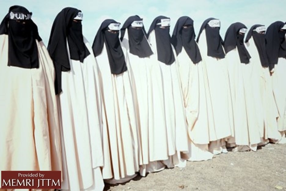 A group of women wearing white and black robesDescription automatically generated