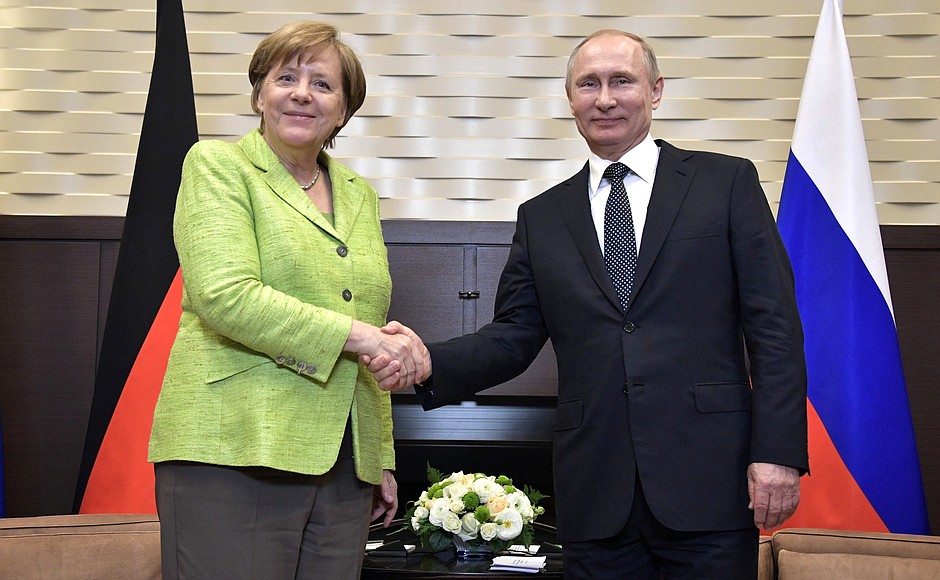 Description: With Federal Chancellor of Germany Angela Merkel.