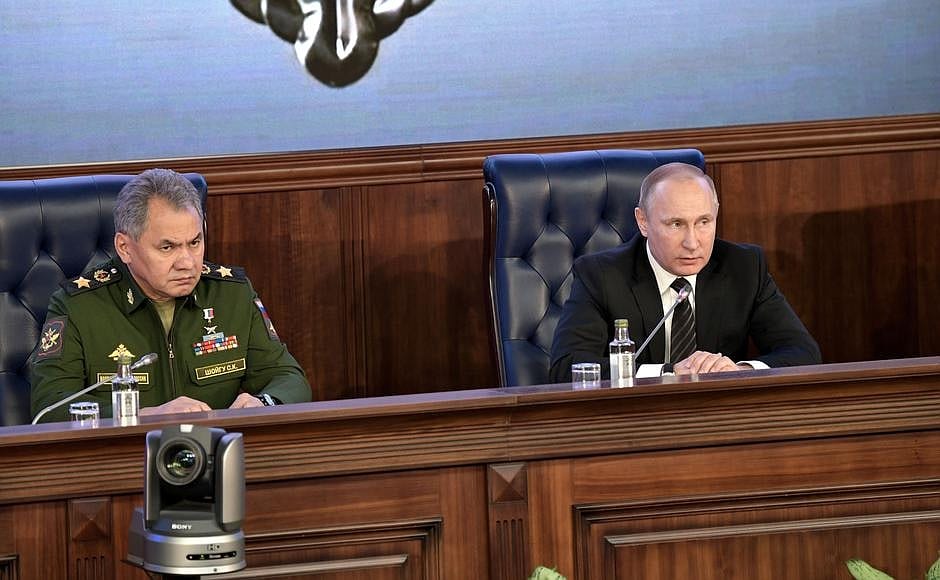 Description: With Defence Minister Sergei Shoigu at the expanded meeting of the Defence Ministry Board.